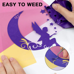 Hand using a tool to remove adhesive from a decorative cutout with fairy design on a pink background.