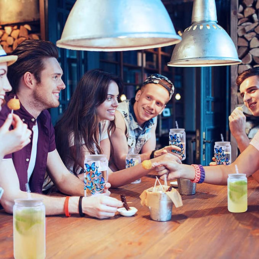 Group of friends enjoying drinks together at a bar.
