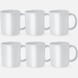 Set of six white mugs on a light gray background