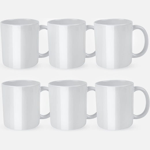 Set of six white mugs on a light gray background