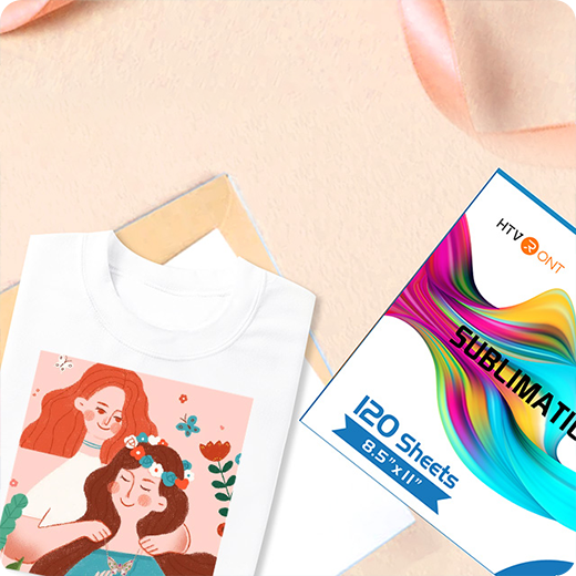 White t-shirt with a colorful graphic and a box of HTV Print Sublimation paper on a beige surface.